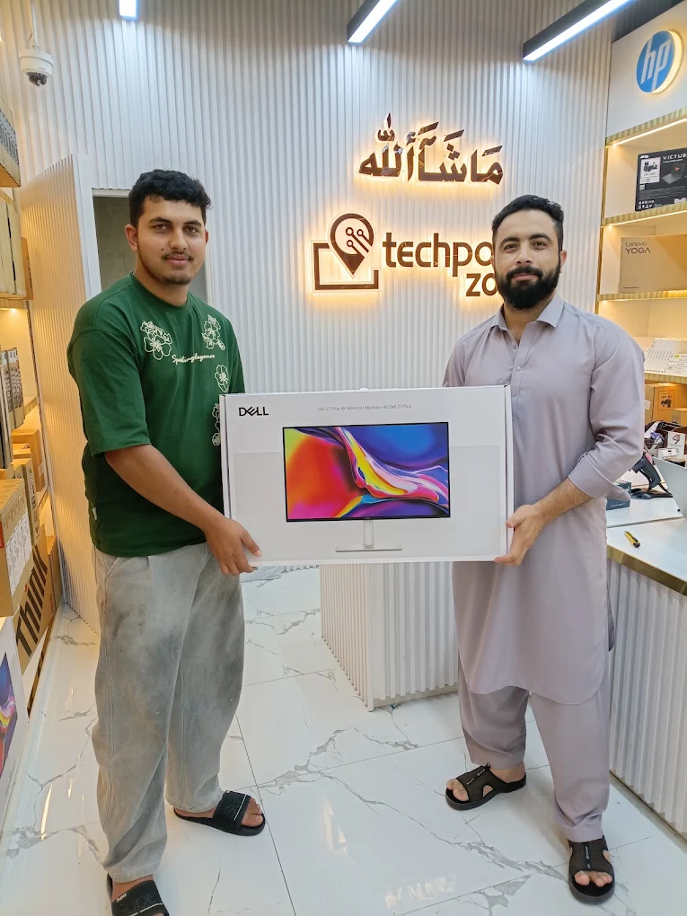 Happy Tech Point Zone customer collecting a Dell 4K monitor in our Bur Dubai store